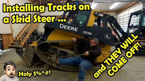 how to install rubber tracks on cat skid steer|installing rubber tracks on skid steer.